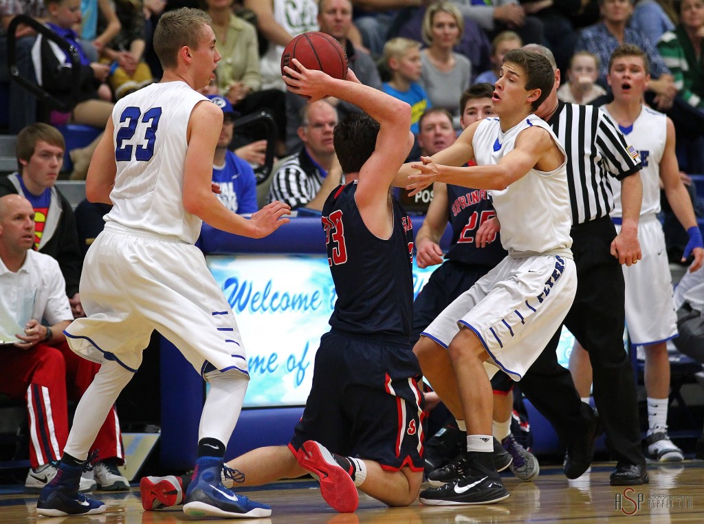 Jake Hawes (23) and Tyler Bennett defend against a Springville player, Dixie vs. Springville, Boys Basketball, St. George, Utah, Dec. 12, 2014 | Photo by Robert Hoppie, ASPpix.com, St. George News