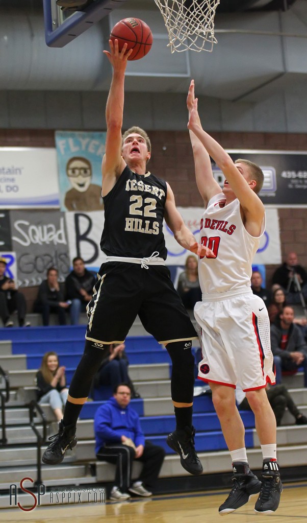 Quincy Mathews lays in a shot late in the game, Desert Hills vs. Springville, Boys Basketball, St. George, Utah, Dec. 13, 2014 | Photo by Robert Hoppie, ASPpix.com, St. George News