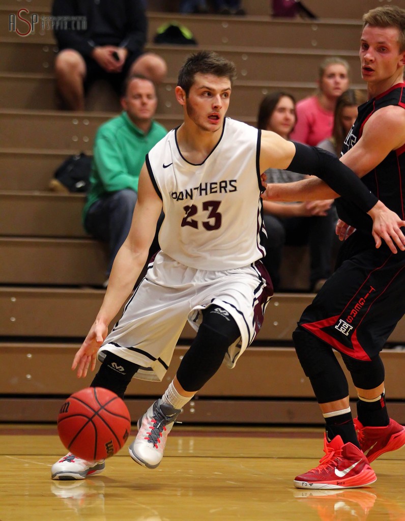 Garrett Bowker drives the baseline, Hurricane vs Pine View, Boys Basketball, St. George, Utah, Dec. 17, 2014 | Photo by Robert Hoppie, ASPpix.com, St. George News