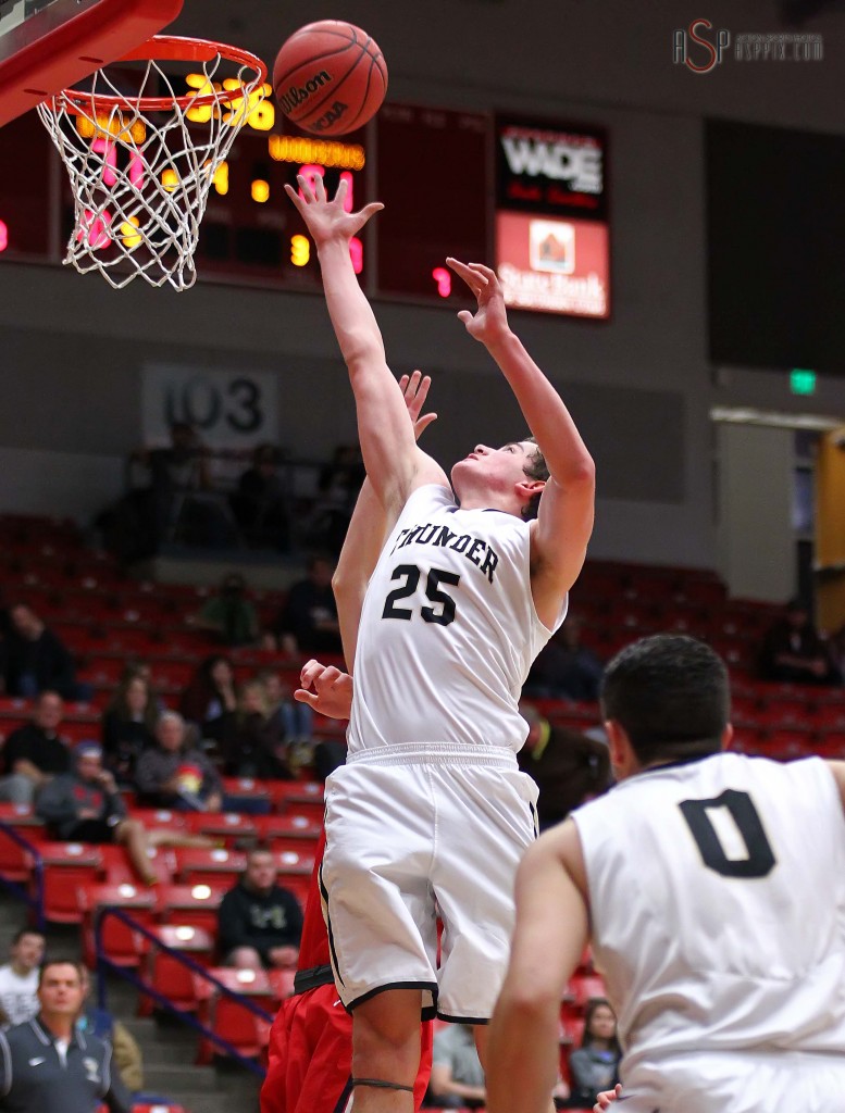 Austin Adams grabs a rebound for the Thunder, Desert Hills vs. Woods Cross, Boys Basketball, St. George, Utah, Dec. 19, 2014 | Photo by Robert Hoppie, ASPpix.com, St. George News