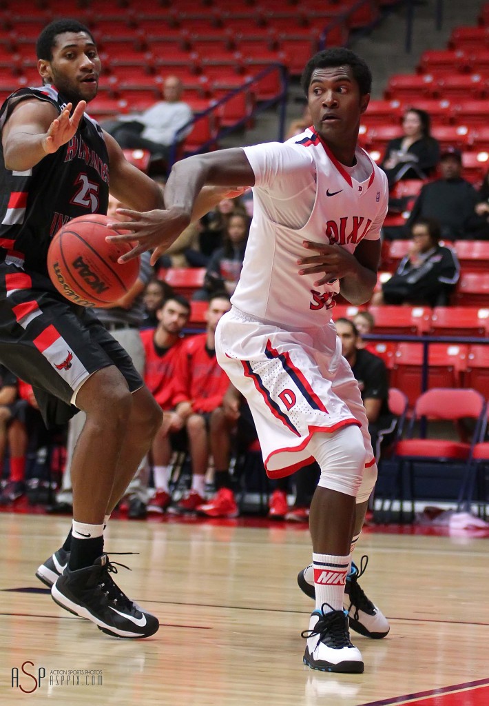 Dixie State G Collin Woods flips a pass in the lane, Dixie State University vs. Holy Names University Mens Basketball, St. George, Utah, Dec. 20, 2014 | Photo by Robert Hoppie, ASPpix.com, St. George News