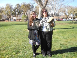 Jackie Campbell (left)and her mom, Jennie Campbell, show a picture of Lt. William Clinton Campbell and the hat he wore the day of Pearl Harbor at the Pearl Harbor Ceremony held at the Vernon Worthen Park, 300 S. 400 E. in St. George, Utah, Dec. 7, 2014 | Photo by Aspen Stoddard, St. George News