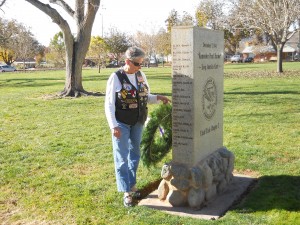 Linda High-Spiry points out her late husband's name on the Pearl Harbor monument at the Vernon Worthen Park, 300 S. 400 E. in St. George, Utah, Dec. 7, 2014 | Photo by Aspen Stoddard, St. George News