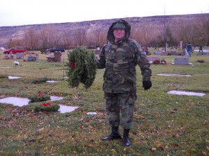 The dark sky sets a somber tone to the Wreaths Across America ceremony Saturday morning at the Tonaquint Cemetery located at 1851 South Dixie Drive in St. George, Utah, Dec. 13, 2014 | Photo by Aspen Stoddard, St. George News