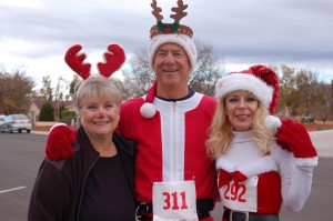 L-R Lois Kraus, Doug Hamilton and Marianne Hamilton don festive gear and prepare to race at the "Run Run Reindeer" family fun run in Ivins, Utah, Dec. 6, 2014 | Photo by Hollie Reina, St. George News