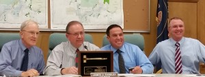 Outgoing commissioner James Eardley (second from right) is honored at his last meeting. L-R Washington County Commissioners Alan Gardner, James Eardley, Victor Iverson, and County Administrator Dean Cox, St. George Utah, Dec. 16, 2014 | Photo by Julie Applegate, St. George News