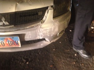 The aftermath of a Mitsubishi hitting into a garage wall, St. George, Utah, Dec. 26, 2014 | Photo by Holly Coombs, St. George News