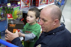 Washington County youth chosen from KONY Coins for Kids were able to shop eat breakfast and shop with local law enforcement at Shop with a Cop, Hurricane, Utah, Dec. 13, 2014 | Photo by Samantha Tommer, St. George News