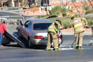 Emergency responders work to clear the scene of an accident at the intersection of 1400 West and Snow Canyon Parkway, St. George, Utah | Photo by Devan Chavez, St. George News