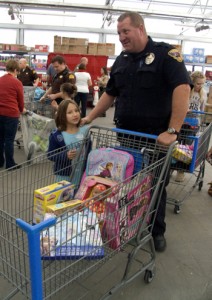 Iron County "Shop with a Cop" helped provide nearly 100 children with Christmas presents, Cedar City, Utah, Dec. 13, 2014 | Photo by Carin Miller, St. George News
