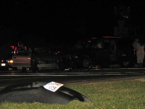 A bumper is ripped entirely off a vehicle in a collision at Bluff Street and 700 South, St. George, Utah, Dec. 3, 2014 | Photo by Carin Miller, St. George News