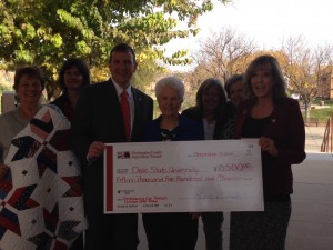 The Washington County Republican Women present a check for $15,500 to DSU president, Richard Williams at Dixie State University, St. George, Utah, Dec. 8, 2014 | Photo by Hollie Reina, St. George News