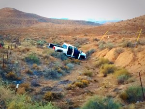 Truck ditched in a ditch by four occupants who fled police on foot near Utah's southern Port of Entry of Interstate 15 southbound, St. George, Utah, Dec. 9, 2014 | Photo by Kimberly Scott, St. George News