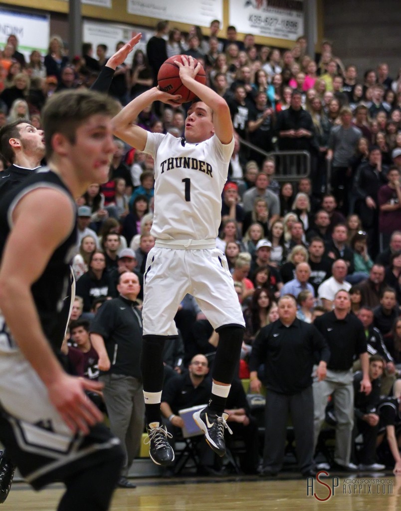 Logan Hokanson (1) with a double clutch jumper late in the contest, Desert Hills vs. Pine View, Boys Basketball, St. George, Utah, Jan. 9, 2015 | Photo by Robert Hoppie, ASPpix.com, St. George News