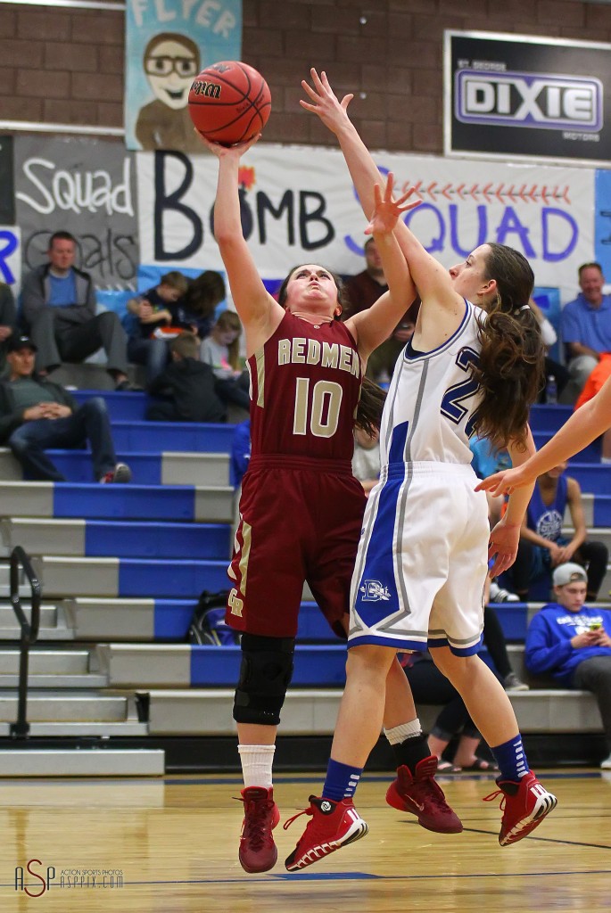 Amanda Manley (10) fires up a shot for the Lady Redmen, Cedar vs. Dixie, Girls Basketball,  St. George, Utah, Jan. 13, 2015 | Photo by Robert Hoppie, ASPpix.com, St. George News