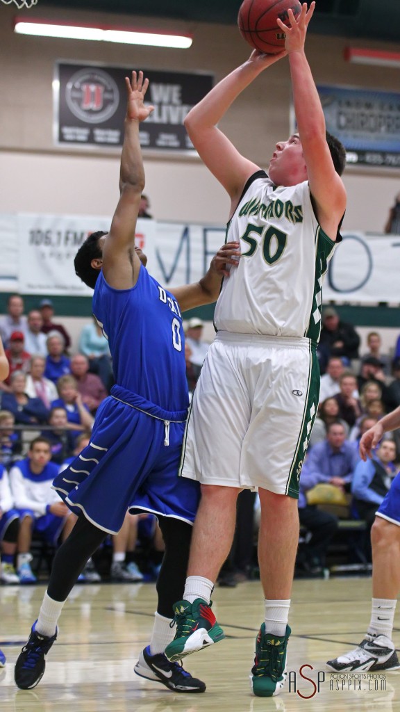 Justin Loveless (50) puts up a shot over Malachi Otis (0), Dixie vs. Snow Canyon, Boys Basketball,  St. George, Utah, Jan. 16, 2015 | Photo by Robert Hoppie, ASPpix.com, St. George News