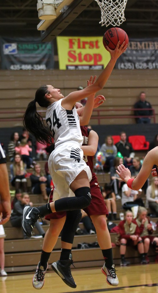 Pine View's Tayvia Ah'Quin (24) takes a reverse layup to the hoop for a score, Cedar vs. Pine View Girls Basketball,  St. George, Utah, Jan. 20, 2015 | Photo by Robert Hoppie, ASPpix.com, St. George News