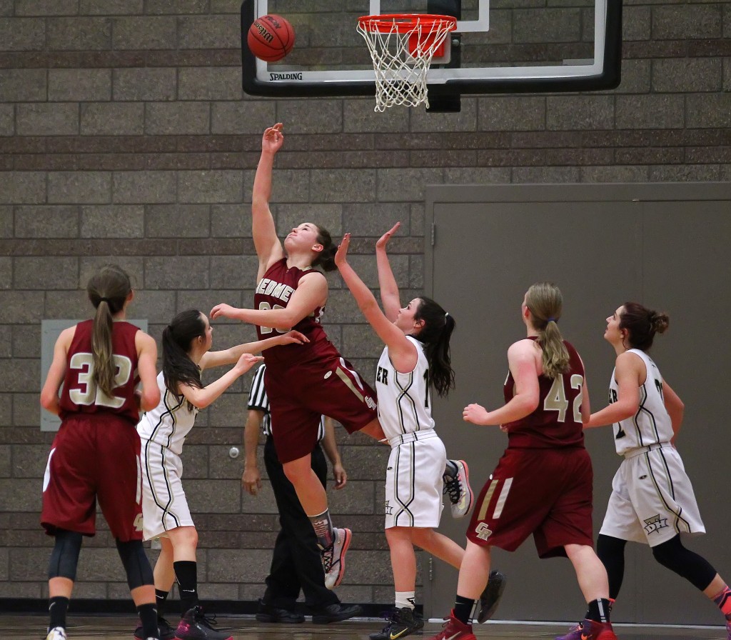 Courtney Morley puts up a reverse layup for the Lady Reds, Cedar vs. Desert Hills, Girls Basketball,  St. George, Utah, Jan. 22, 2015 | Photo by Robert Hoppie, ASPpix.com, St. George News