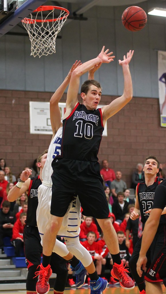 Hurricane's Austen Beatty (10) reaches for a rebound, Hurricane vs. Dixie, Boys Basketball,  St. George, Utah, Jan. 23, 2015 | Photo by Robert Hoppie, ASPpix.com, St. George News