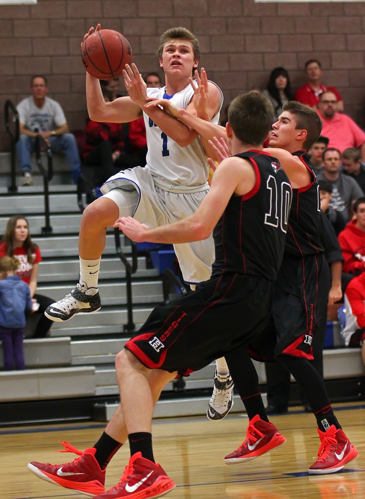 RJ Wilgar (1) puts up a shot for the Flyers, Hurricane vs. Dixie, Boys Basketball,  St. George, Utah, Jan. 23, 2015 | Photo by Robert Hoppie, ASPpix.com, St. George News