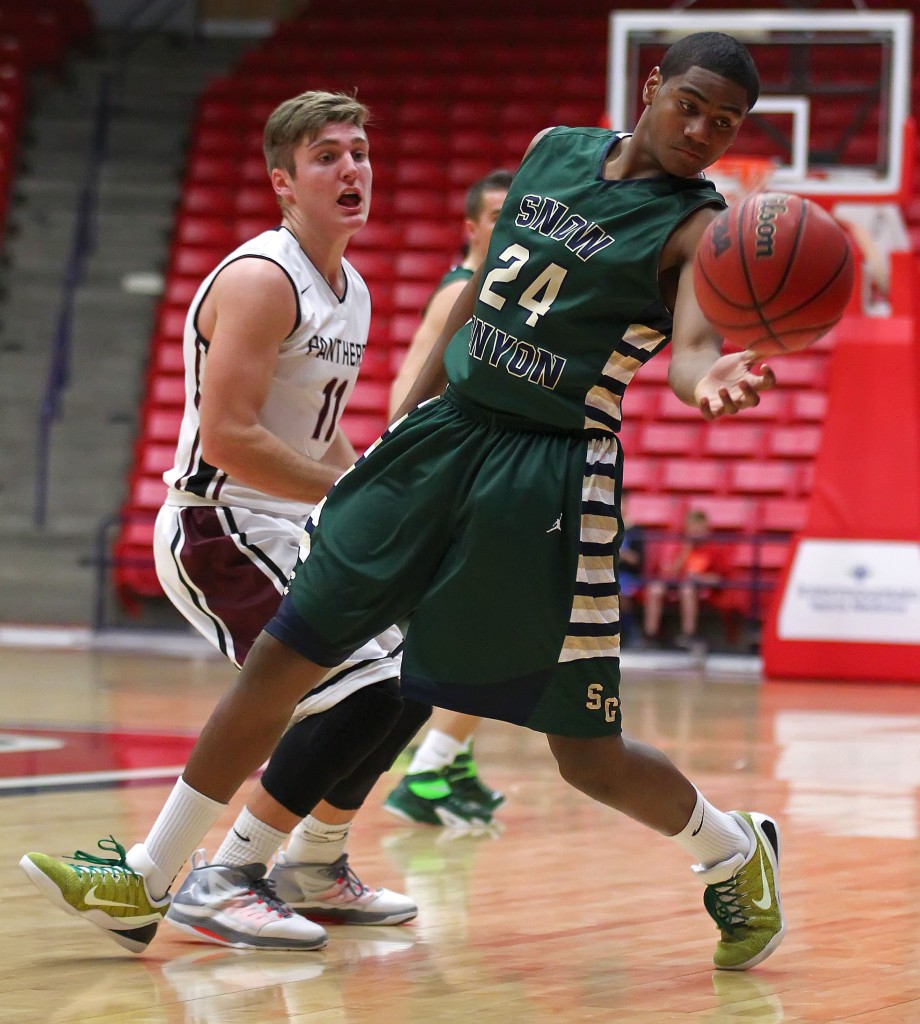 TJ Taimi (24) tries to save a ball from going out of bounds for the Warriors, Snow Canyon vs. Pine View, Boys Basketball,  St. George, Utah, Jan. 23, 2015 | Photo by Robert Hoppie, ASPpix.com, St. George News