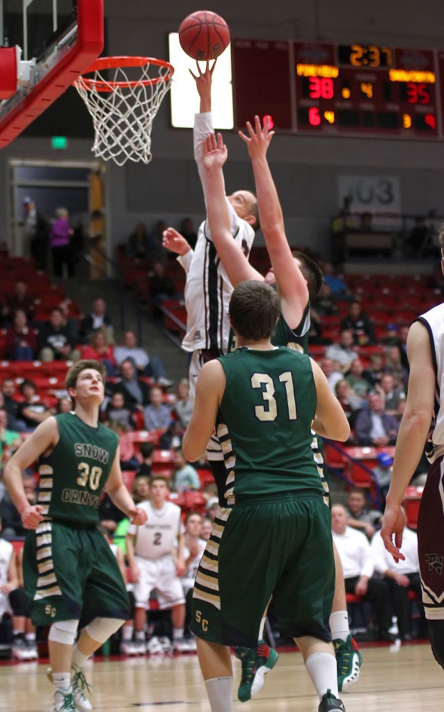 Jed Newby tips in rebound for a key basket late in the contest for the Panthers, Snow Canyon vs. Pine View, Boys Basketball,  St. George, Utah, Jan. 23, 2015 | Photo by Robert Hoppie, ASPpix.com, St. George News