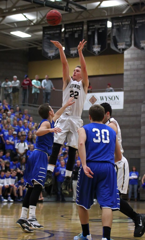 Quincy Mathews (22) with a jumper from 3-point range, Dixie vs. Desert Hills, Boys Basketball, St. George, Utah, Jan. 28, 2015 | Photo by Robert Hoppie, ASPpix.com, St. George News