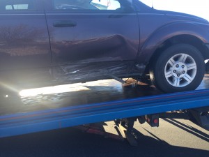 Damage to a Dodge SUV involved in an accident on Telegraph Street, Washington, Utah, Jan 2, 2015 | Photo by Brett Brostrom, St. George News