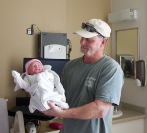 Grandfather, Tim Canfield with New Year Baby, Allison Davis, St. George, Utah, Jan.1, 2015 | Photo by Samantha Tommer, St. George News