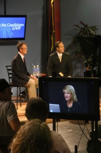 Brock Belnap and Nathan Caplin, face off for the county attorney position in a live debate held at the Dixie State University, St. George News Editor-in-Chief Joyce Kuzmanic on monitor in the foreground. St. George, Utah, June 20, 2014 | Photo by John Teas, St. George News