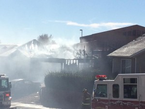 Fire crews battle a house fire in Hurricane, Utah, Feb. 25, 2015 | Photo by Kimberly Scott, St. George News