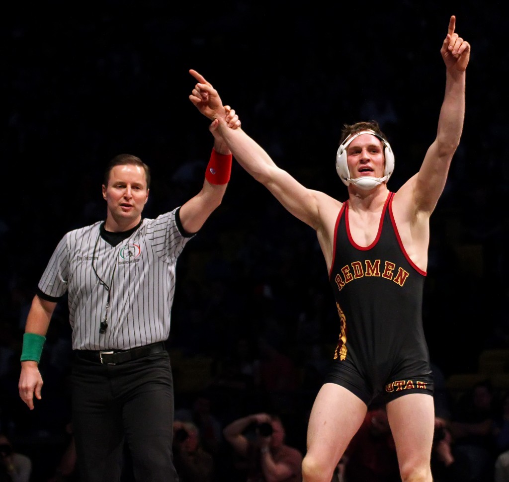 Dallin Brooks (black singlet) wins the 160-pound state final match for Cedar, 3A State Wrestling Tournament, Orem, Utah, Feb. 14, 2015 | Photo by Robert Hoppie, ASPpix.com, St. George News