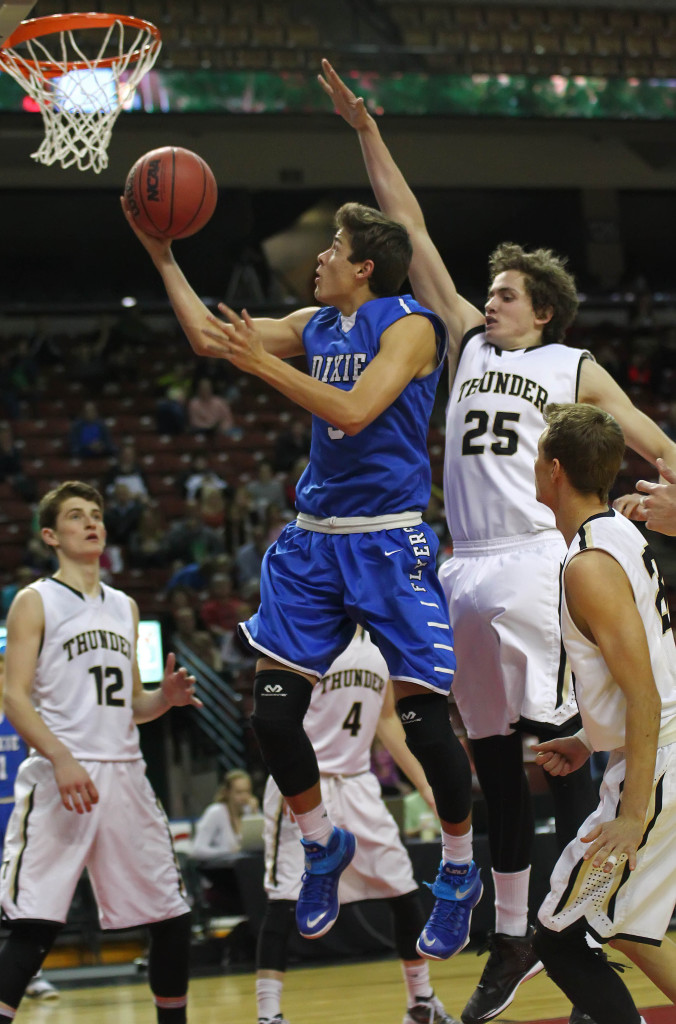 Tyler Bennett slips a shot past Austin Adams (25), Desert Hills vs. Dixie, 3A State Basketball Tournament, Salt Lake City, Utah, Feb. 27, 2015 | Photo by Robert Hoppie, ASPpix.com, St. George News