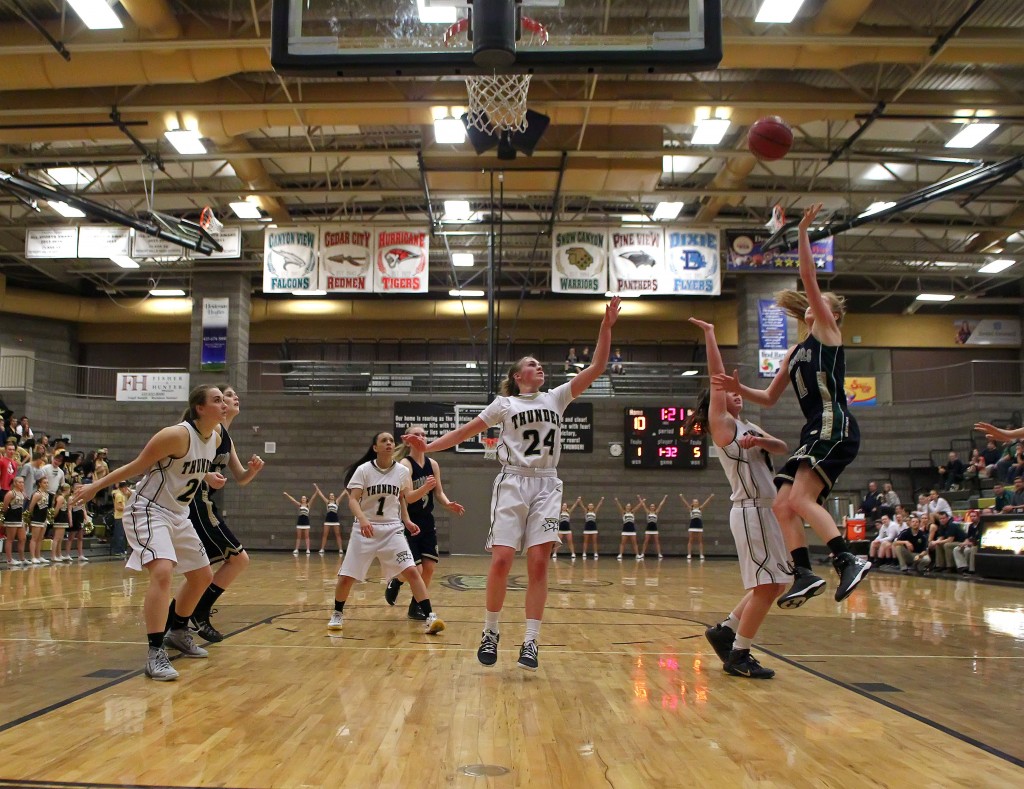 Nikenna Durante drives the lane and puts up a layup for Snow Canyon, Snow Canyon vs. Desert Hills, Girls Basketball, St. George, Utah, Feb. 5, 2015 | Photo by Robert Hoppie, ASPpix.com, St. George News