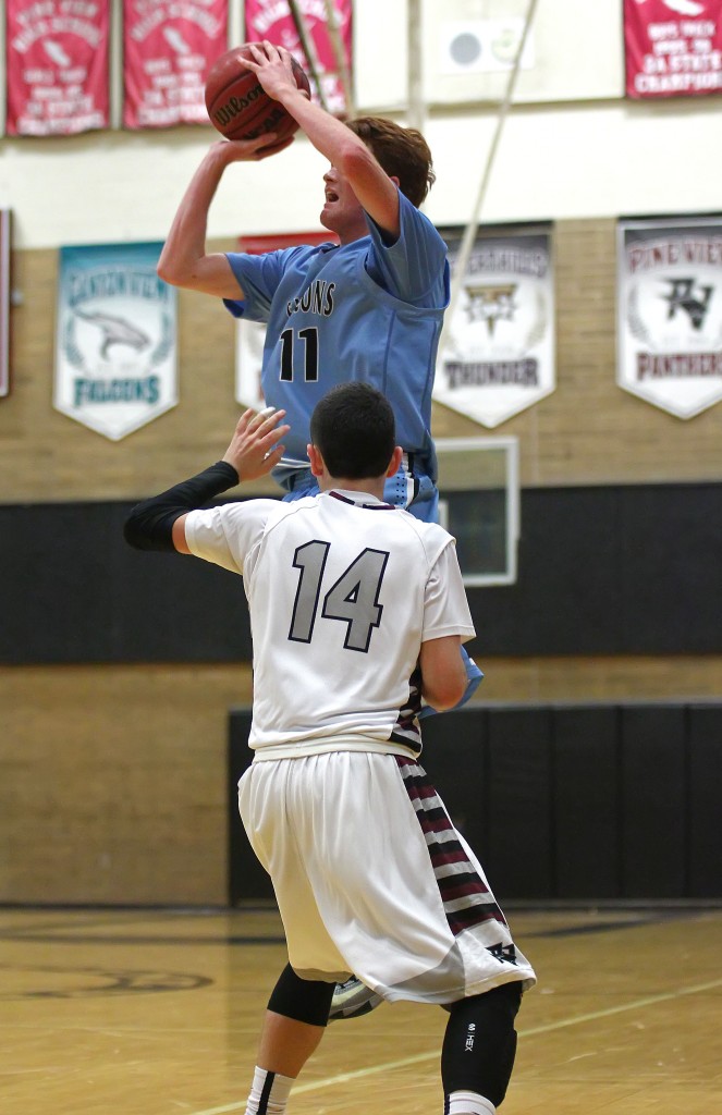 Sterling Barnes (11) fires up a 3-pointer at the end of regulation time to tie the game, Pine View vs. Canyon View, Boys Basketball, St. George, Utah, Feb. 6, 2015 | Photo by Robert Hoppie, ASPpix.com, St. George News