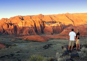 Couple taking in the scenery of the red rock mountains, St. George, Utah, date unspecified | Image courtesy of Adventure Hub, St. George News