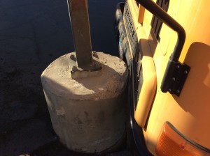 A school bus strikes a light pole behind Snow Canyon Middle School, St. George, Utah, Feb. 11, 2015 | Photo by Holly Coombs, St. George News