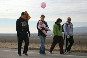 "Utah's Forrest Gump," Joshua Bryant walks with friends and family toward the finish line at the state line into Idaho, near Portage, Utah, Feb. 1, 2015 | Photo courtesy of Lori Murray Burlison, St. George News