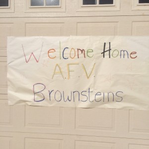 The family returns home from the taping of America's Funniest Home Videos to a banner decorated by neighbors, Santa Clara, Utah, Jan., 2015 | Photo courtesy of Rebecca Brownstein, St. George News