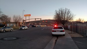 St. George Police officers attend to the scene of a collision between a moped and an SUV, St. George, Utah, Feb. 12. 2015 | Photo by Mori Kessler, St. George News