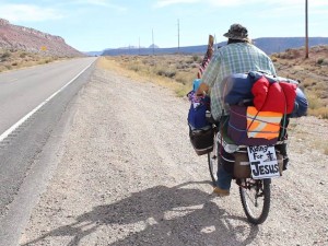 Gary Madison Mark travels across state Route 59 on his cross-country journey, Washington County, Utah, Feb. 6, 2015 | Photo by Leanna Bergeron, St. George News