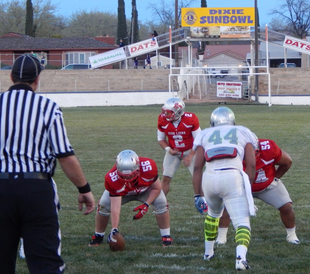 Misi Tupe calls for the snap from Trevor Stott in the first Zion Lions game at the Dixie Sun Bowl, St. George, Utah, mar. 21, 2015 | Photo by Andy Griffin, St. George News