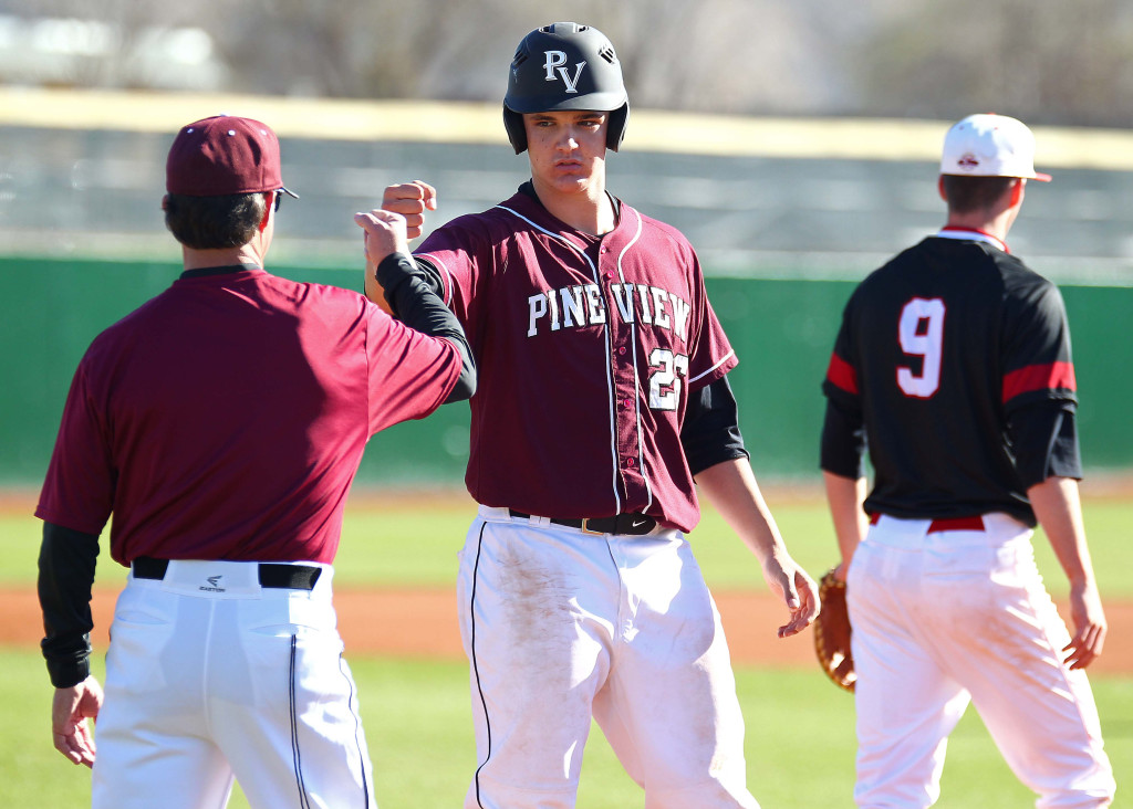 Harrison Goebel gets congratulations after a run scoring hit early in the game, American Fork vs. Pine View, Baseball, St. George, Utah, Mar. 13, 2015 | Photo by Robert Hoppie, ASPpix.com, St. George News