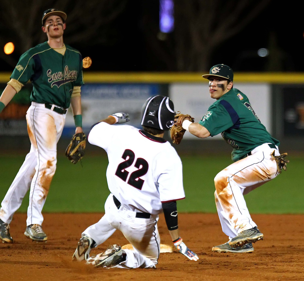 Nick Dolce looks to turn a double play for Snow Canyon, West vs. Snow Canyon, Baseball, St. George, Utah, Mar. 13, 2015 | Photo by Robert Hoppie, ASPpix.com, St. George News