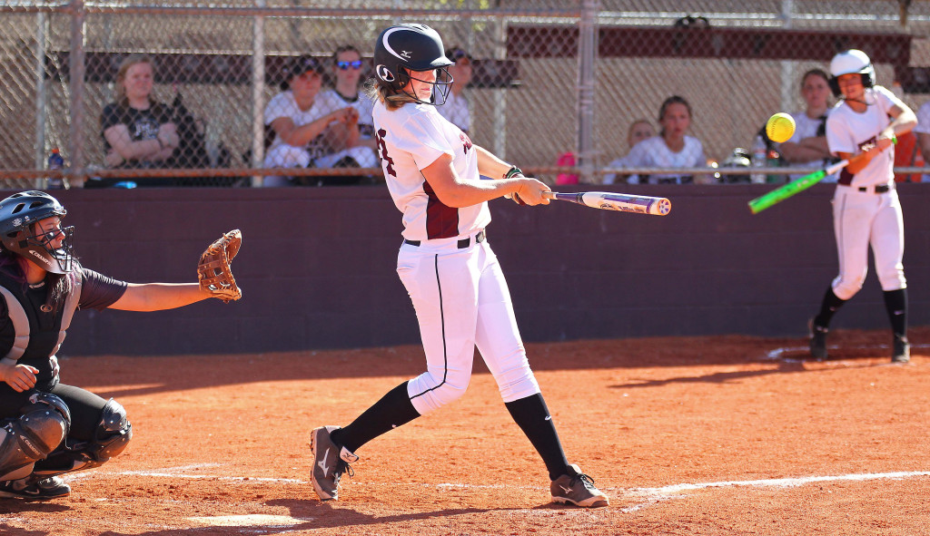 Addi Horspool makes contact for the Panthers, Desert Hills vs. Pine View, Softball, St. George, Utah, Mar. 24, 2015 | Photo by Robert Hoppie, ASPpix.com, St. George News