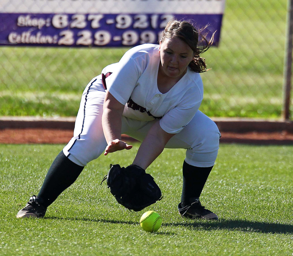 Aubrey Neilson picks up a slow roller in the outfield, Desert Hills vs. Pine View, Softball, St. George, Utah, Mar. 24, 2015 | Photo by Robert Hoppie, ASPpix.com, St. George News