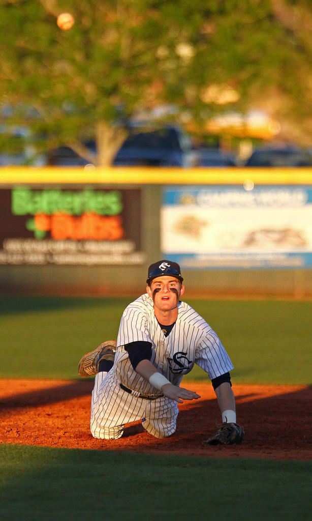 Snow Canyon shortstop Brad Grisenti makes a throw from his knees, Canyon View vs. Snow Canyon, Baseball, St. George, Utah, Mar. 27, 2015 | Photo by Robert Hoppie, ASPpix.com, St. George News