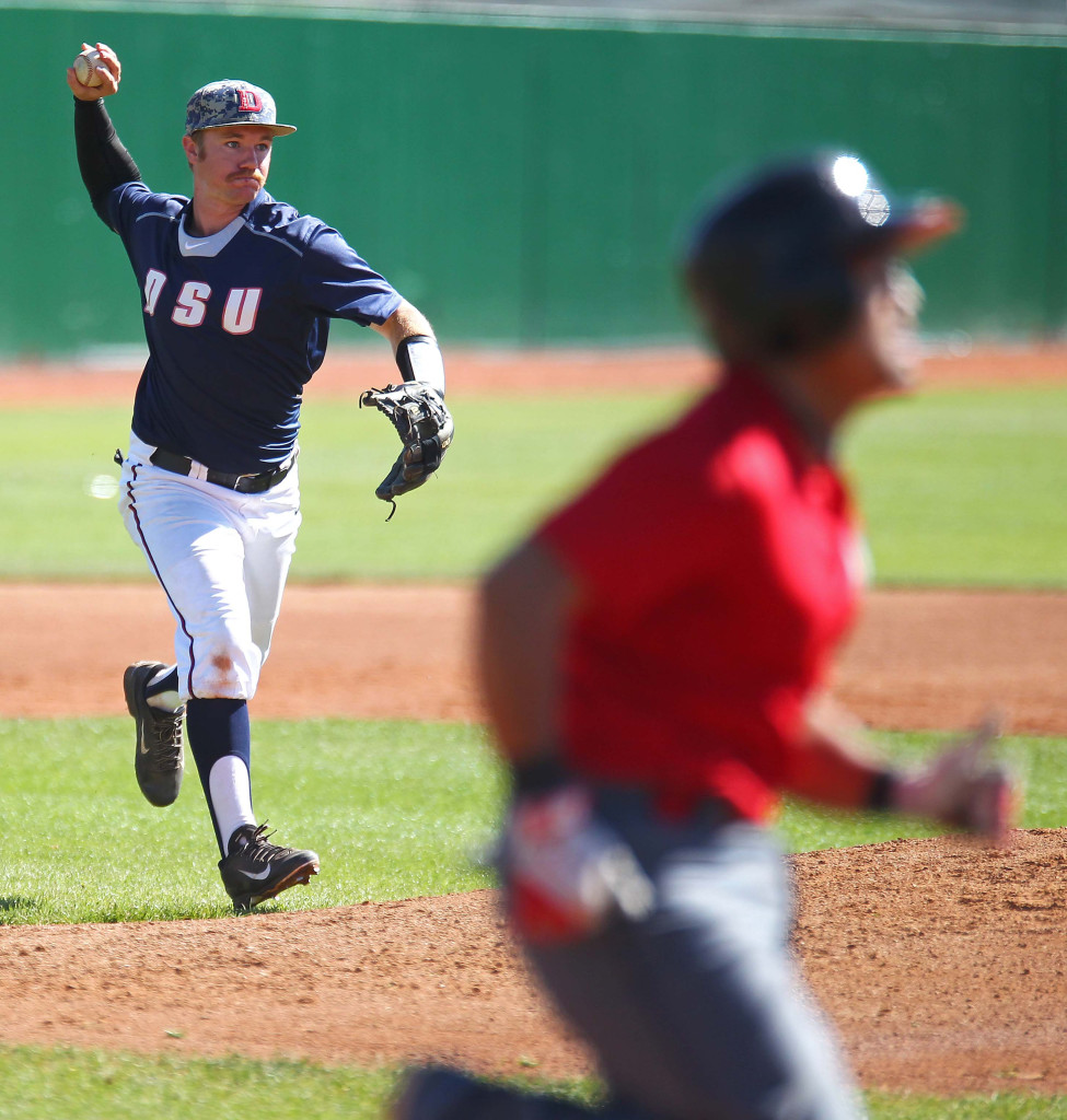 Red Storm third baseman Austin Nelson fires the ball to first base for an out, Dixie State University vs. Academy of Art University, Baseball, St. George, Utah, Mar. 28, 2015 | Photo by Robert Hoppie, ASPpix.com, St. George News