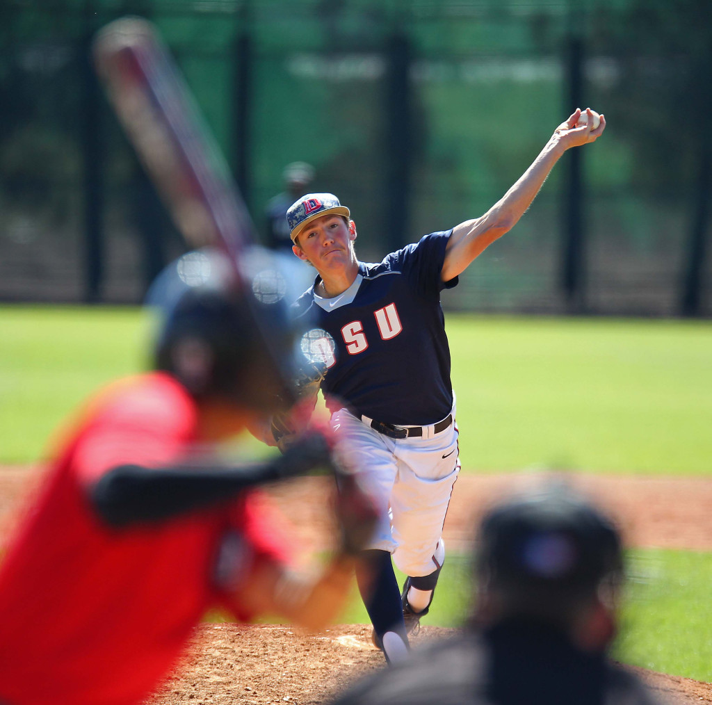 Dixie State starting pitcher Aaron Pope delivers a pitch, Dixie State University vs. Academy of Art University, Baseball, St. George, Utah, Mar. 28, 2015 | Photo by Robert Hoppie, ASPpix.com, St. George News