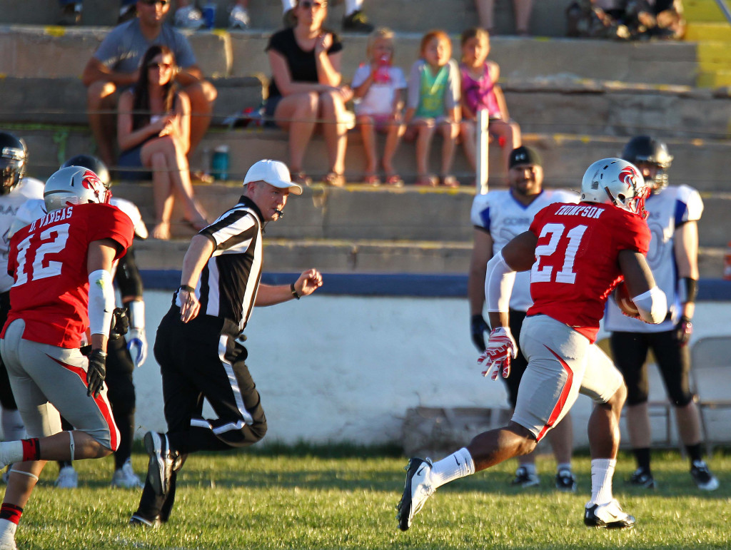 Brandon Thompson (21) heads for the end zone after scooping up a Cobra fumble, Zion Lions vs. Utah Cobras, Football, St. George, Utah, Mar. 28, 2015 | Photo by Robert Hoppie, ASPpix.com, St. George News